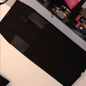 BCBGMAXAZRIA black dress with leather pockets.